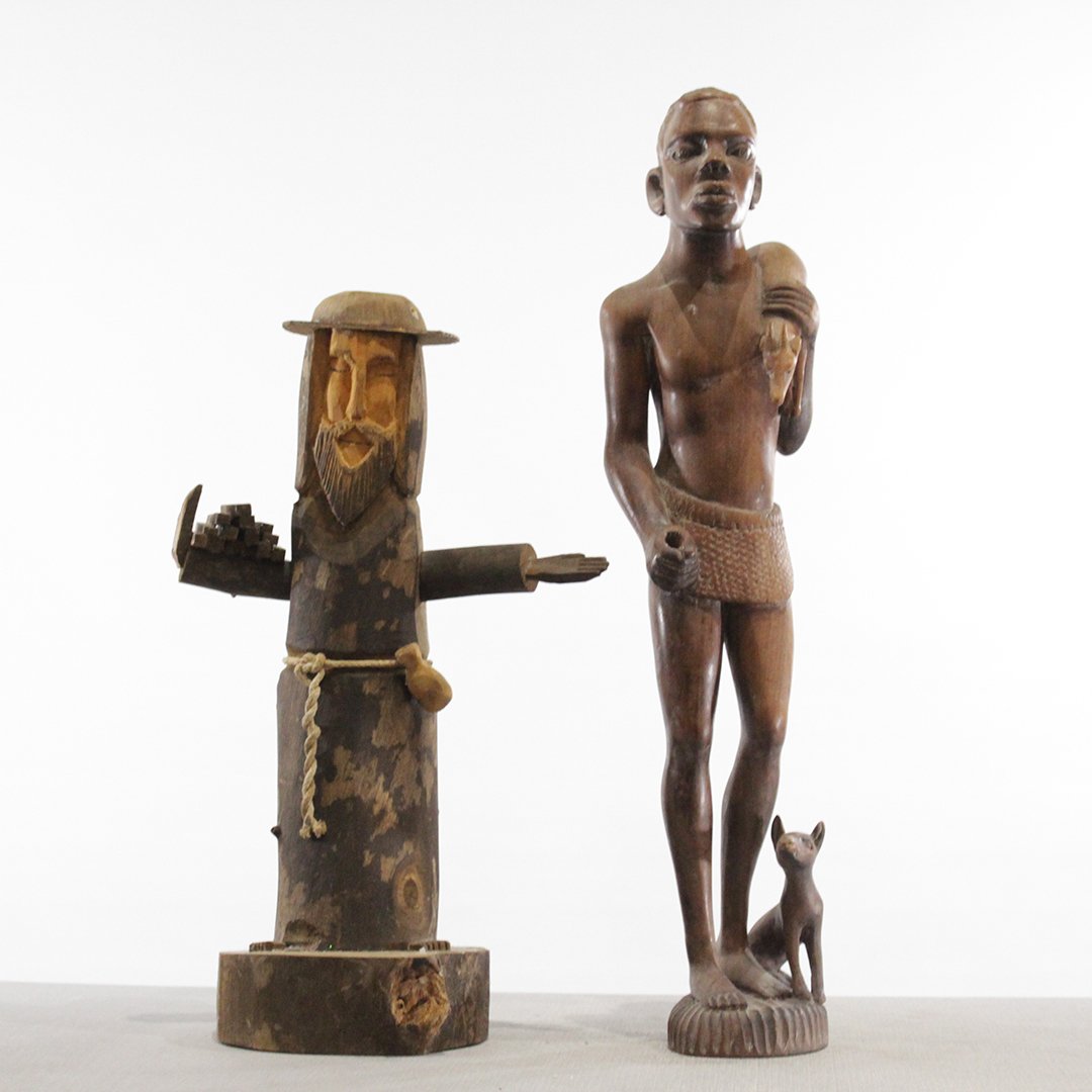 Two [2] Wood Carved Statues, Folk Art Man & African Boy: Two [2] Wood Carved Statues, Folk Art Man [signed Ben Ortega] & African Boy in teak wood [signed Koli]. Sizes: 17.25 in. height, 10 in. wide, and 21.5 in. height, 4.5 in. wide.
