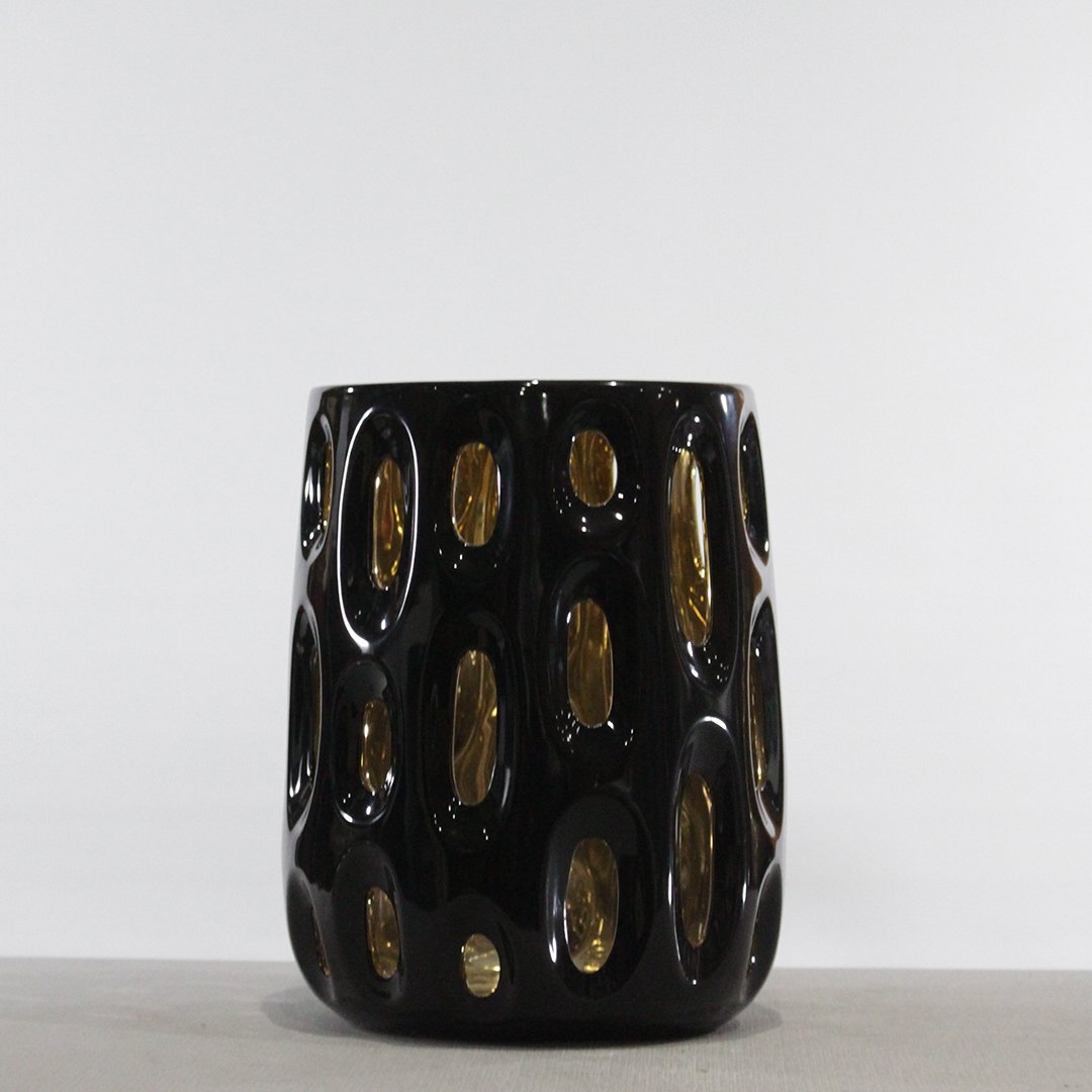 Modern Design Black Ceramic Ice Bucket with Open Window: Modern Design Black Ceramic Ice Bucket with Open Windows of ovals. Unique. Size: 12.5 in. height, 9.5 in. wide.