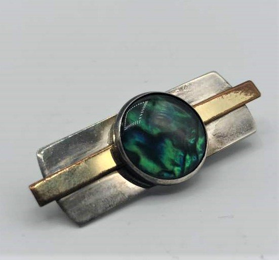 Sterling with Gold Filled Strip, Abalone Center Brooch: Sterling with Gold Filled Strip, Abalone Center Brooch. Marked: Sterling / G.F. ; Size: 1.75 in. length, 1/2 in. wide