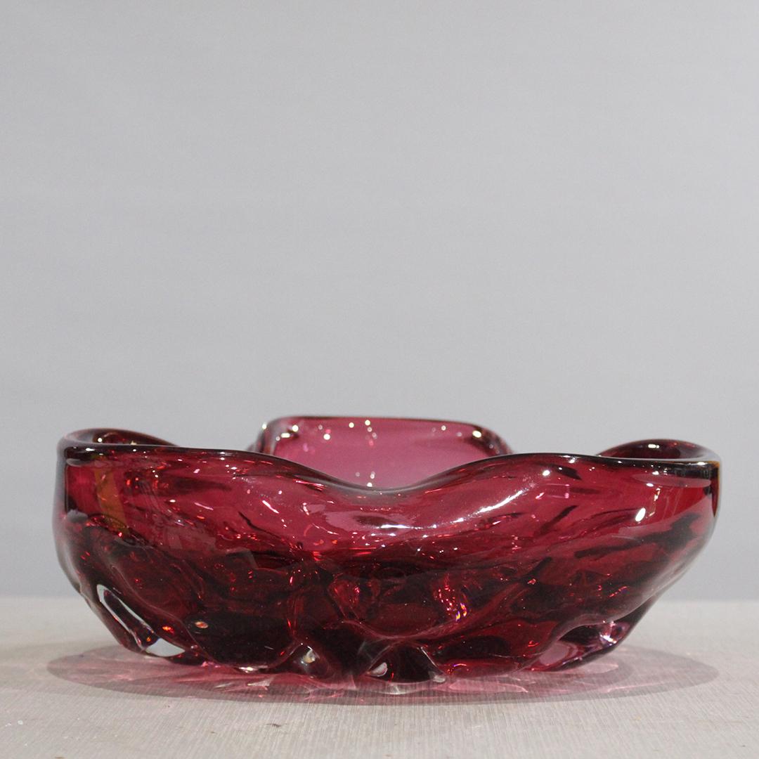 Mid-Century Modern Murano Cranberry Glass Bowl: Mid-Century Modern Murano Cranberry Glass Bowl , Free form, thick glass. Size: 4 x 11 inches