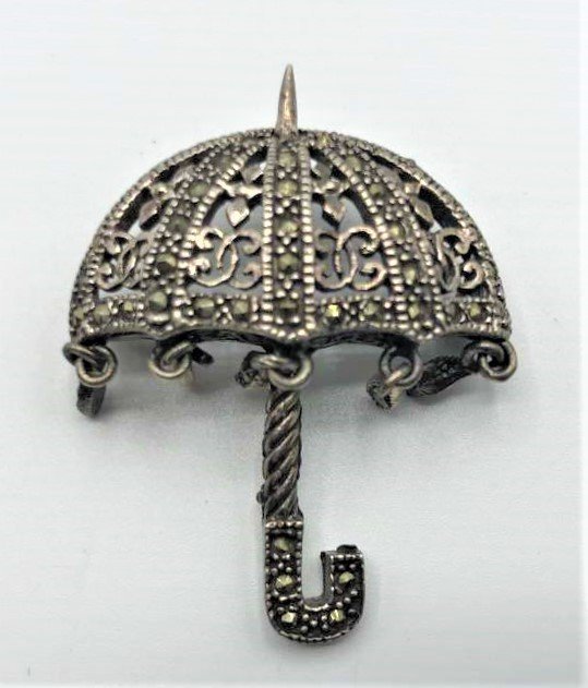 STERLING And MARCASITES Umbrella Brooch / Pendant: STERLING And MARCASITES Umbrella Brooch / Pendant. Ornate. Size: 1 5/8 in. x 1 1/4 in.