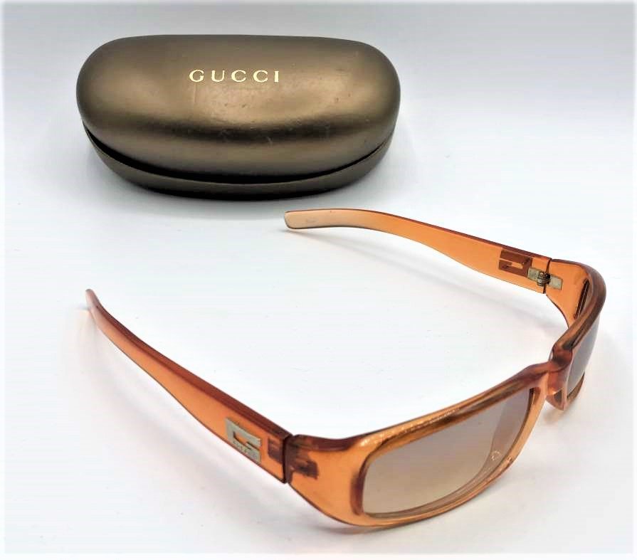 Vintage Gucci Celluloid Sunglass Frames w/ Gucci Holder: Vintage Gucci Celluloid Sunglass Frames w/ Gucci Holder. Marked: G1009. Size Holder box: 6.5 in. x 3 in.