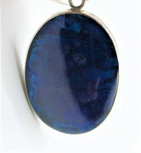 Sterling Silver Necklace Large Blue Abalone MOP Pendant: Sterling Silver Necklace Large Blue Abalone, MOP on back Pendant. Marked: .925 ; Size Pendant 1.75 in. x 1.25 in.; chain 16 in. length.