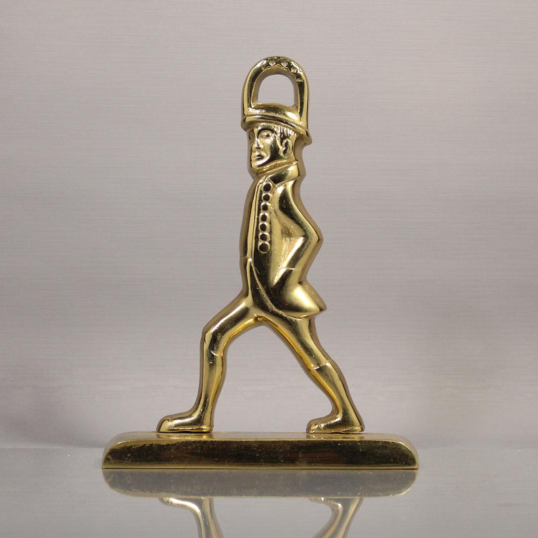 Englishman Door Stop Cast Brass, Polish Varnish Finish: Englishman Door Stop Cast Brass, Polish Varnish Finish. Mas markings and numbers on back. Size: 8.5 x 6.5 inches