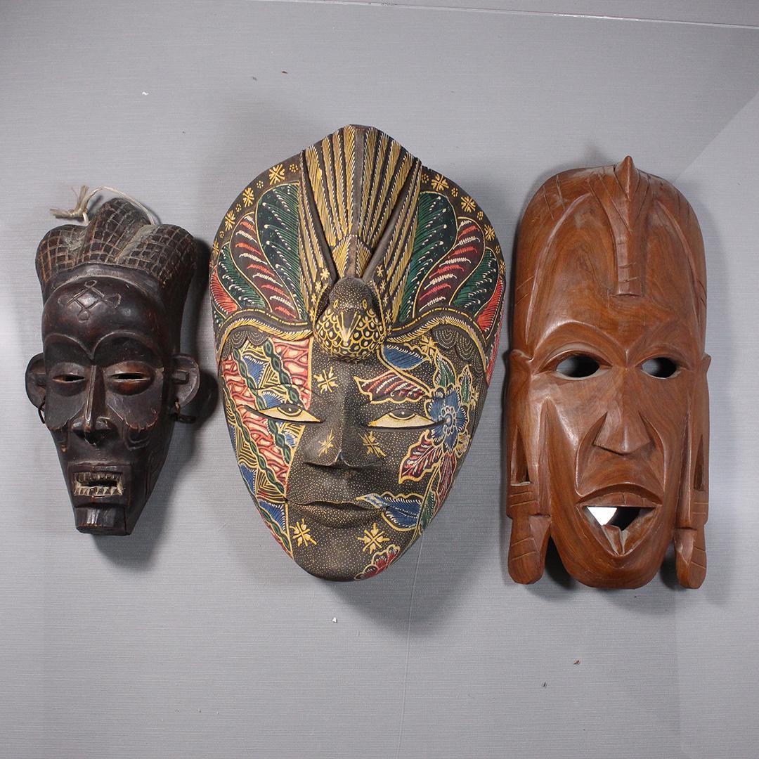 Three Assorted Carved Wood Ceremonial Masks Indonesian: Three Assorted Carved Wood Ceremonial Masks Indonesian. Size: 10.25 x 5.25, 13 x 9, 12.5 x 6 inches