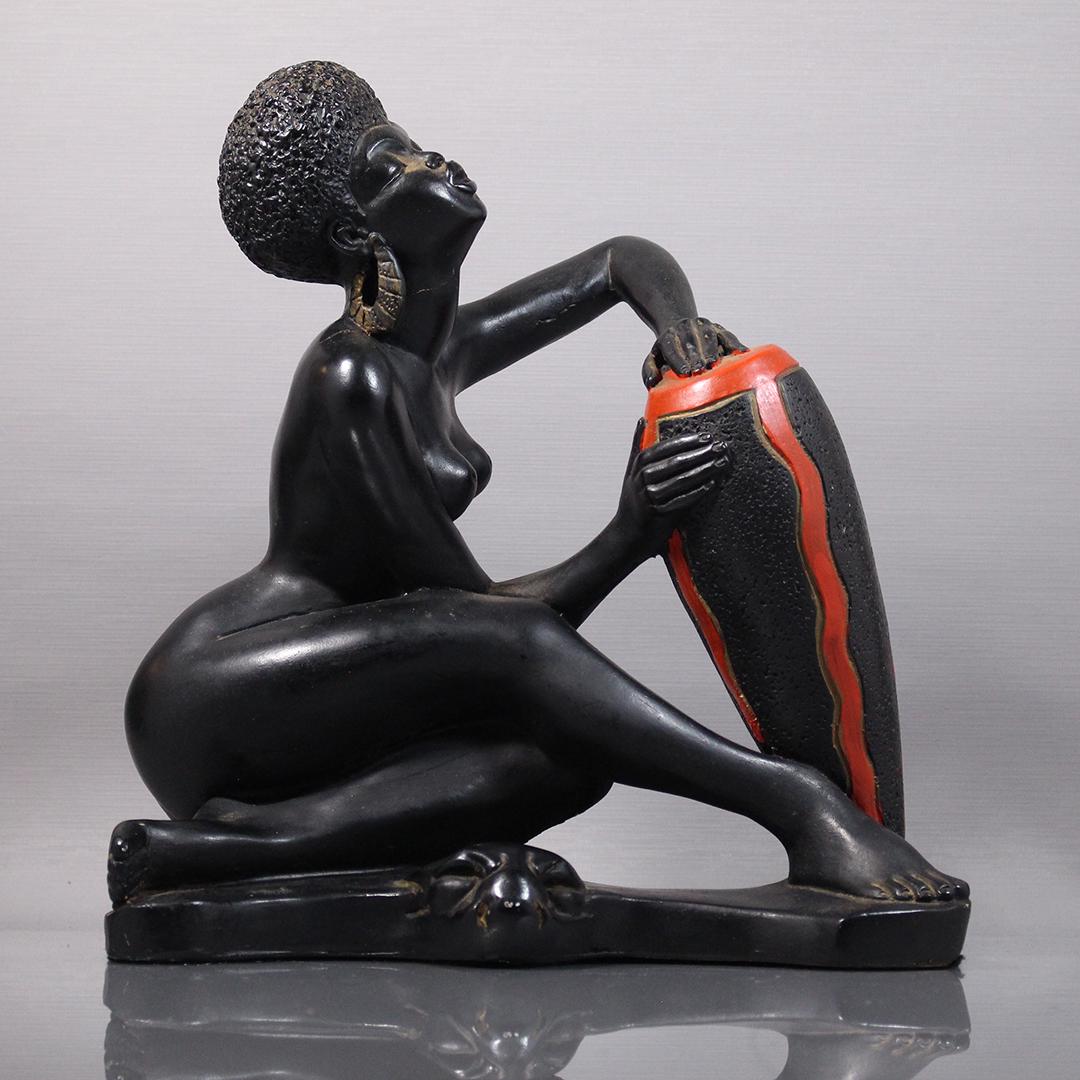 Nude African Woman Playing Congo Drum by Marwal: Nude African Woman Playing Congo Drum by Marwal Ind., signed. Made of Hard Composition, original finish. Size: 12.5 h 11.5 w