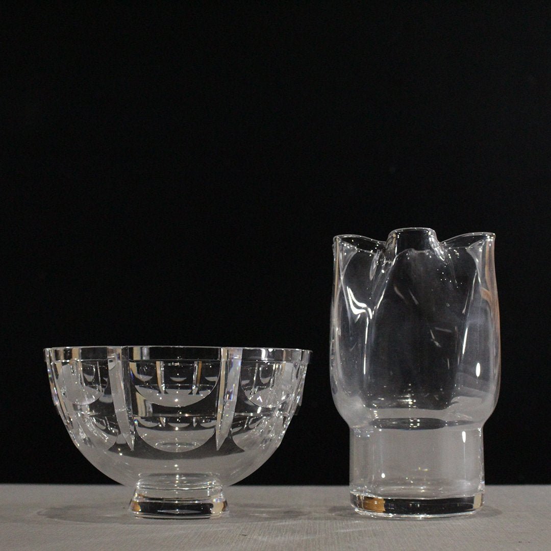 Two [2] Signed ORREFORS Crystal Glass Bowl & Vase: Two [2] Signed ORREFORS Crystal Glass Bowl & Vase. Mid-Century Modern. Both are signed. Sizes: bowl 4.75 in. height, 7.5 in. diameter; vase: 7.75 in. height, 5 in. wide