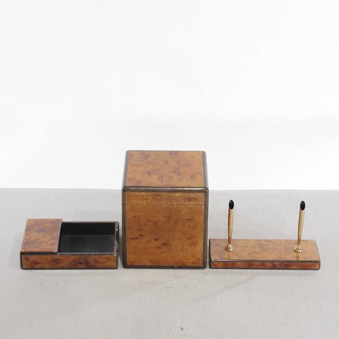 Tiffany & Co. Exotic Burl Wood 3 Piece Desk Set: Tiffany & Co. Exotic Burl Wood 3 Piece Desk Set. Covered Box, Pad holder, Pen Holder. Bras tag inside covered box: Tiffany & Co.Sizes: covered box, 6.75 in. height, 6 in. wide, 6 in. depth; pad holder