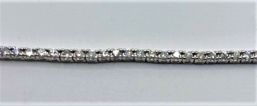 10 K White Gold Diamonds Tennis Bracelet 57 Diamonds: 10 K White Gold Diamonds Tennis Bracelet 57 Diamonds; 1.75 CTW., Size: 6.25 in. length
