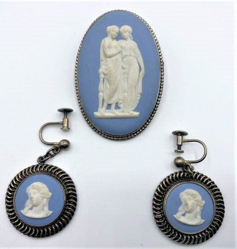 3 Piece Wedgwood England Jasperware Brooch & Earrings: 3 Piece Wedgwood England Jasperware Brooch & Earrings. Marked: Wedgwood England. Sterling Silver marked frames. Size: brooch 2 in. x 1 3/8 in.; earrings 1 in. diameter