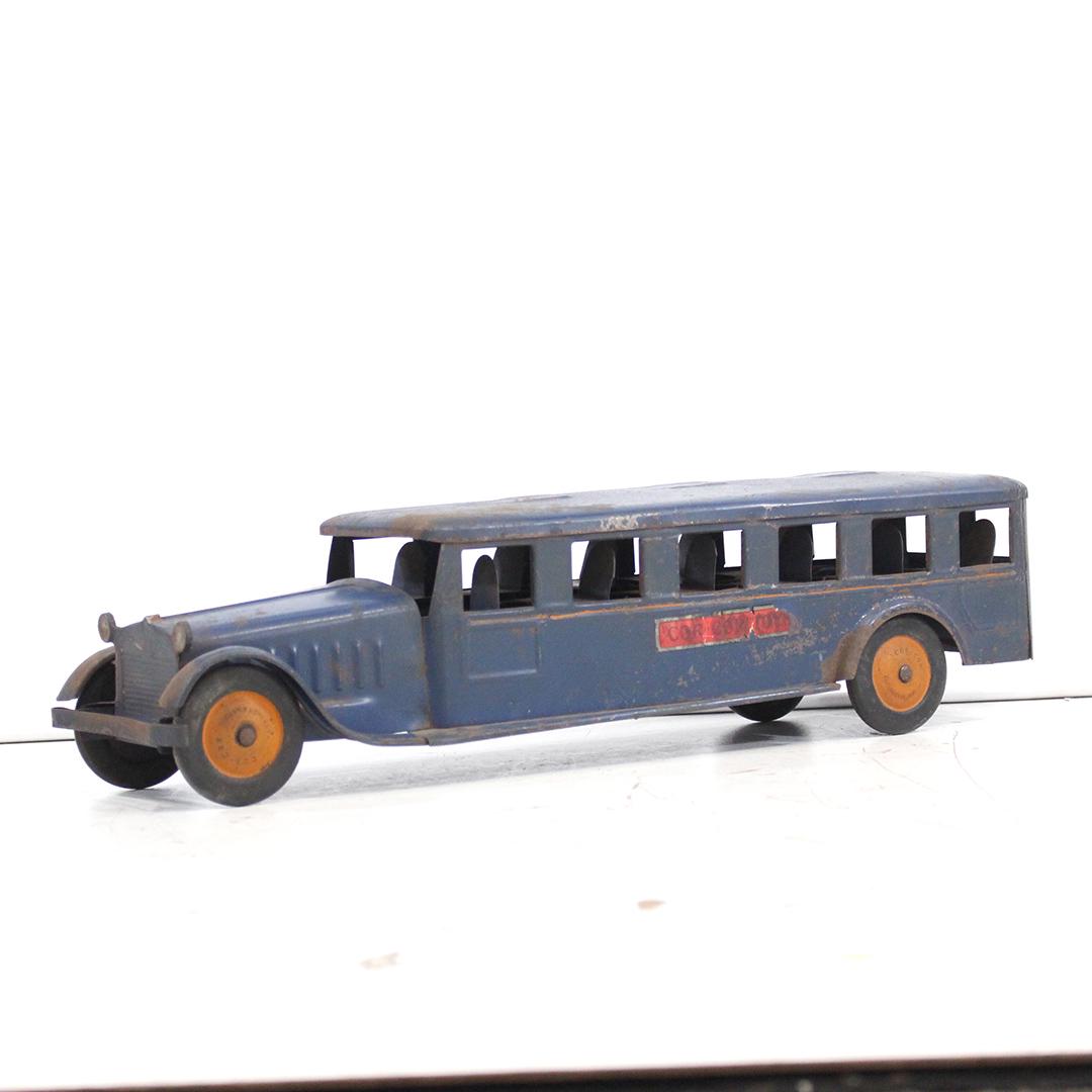 Antique Toy Pressed Steel Cor-Cor Toy Blue Bus: Antique Toy Pressed Steel Cor-Cor Toy Blue Bus. Original blue paint and decals. Clean. Size: 6 in. height, 23.5 in. length, 6.5 in. wide