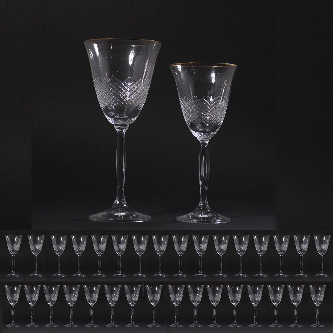 32 Pcs. Two Sets of 16 Diamond Quilted Cut Glass Wine: 32 Pcs. Two Sets of 16 Diamond Quilted Cut Glass Wine Stemware. Nice quality crystal glasses. Size: 16x 8.5 h ,16x 7.5 h ,