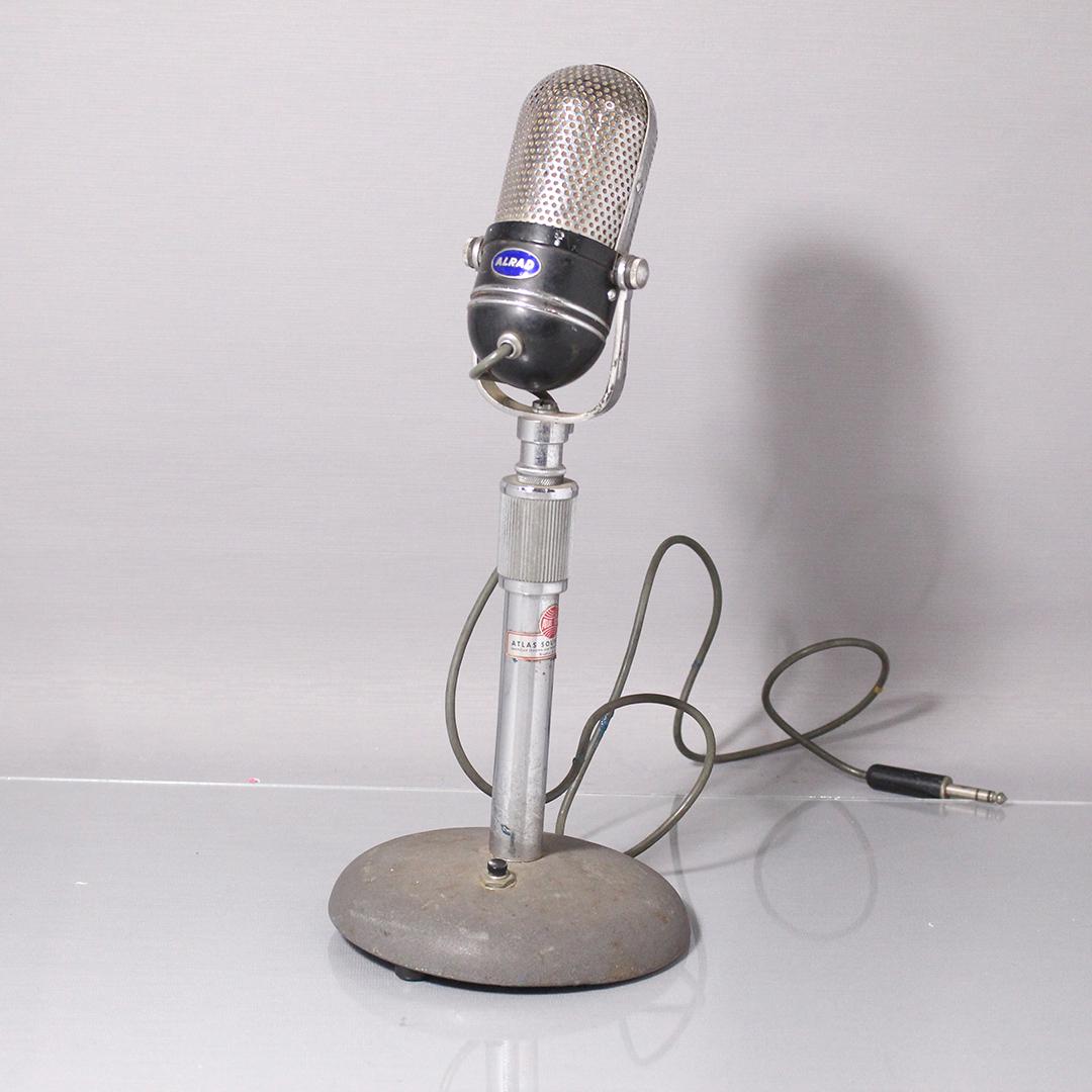 Alrad Vintage Microphone on Table Top Stand: Alrad Vintage Microphone on Table Top Stand, Atlas Sound. Clean. . Size: 14.5 in. height, 6 in. wide base.