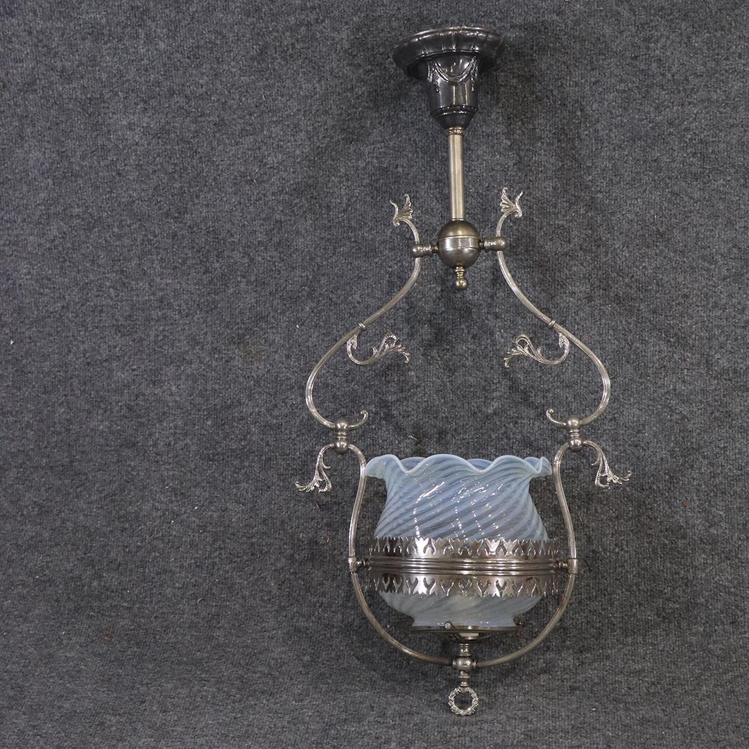 Victorian Hall Fixture Nickle Plated Frame Opalescent: Victorian Hall Fixture Nickle Plated Frame Opalescent Swirl Glass Shade. Electrified, wiring all good. Size: 31 in. length, 15 in. wide, 8.5 in. diameter shade