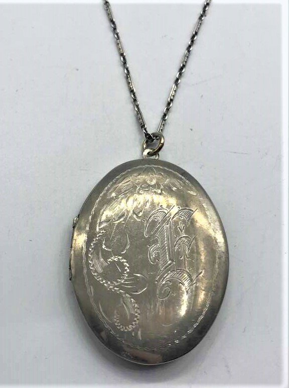 Nickel Silver Victorian Etched Locket Pendant on Chain: Nickel Silver Victorian Etched Locket Pendant with linked Chain. Size: locket: 2 in. x 1.5 in.; chain 20 in. length.
