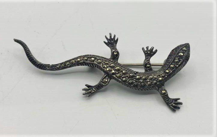 Sterling Silver with Marcasites Lizard Figure Brooch: Sterling Silver with Marcasites Lizard Figure Brooch. Marked: Sterling. Size: 2 1/4 in. x 7/8 in.
