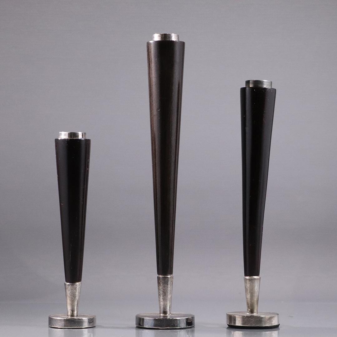 3 Chrome Ebony Mid-Century Tall Candlesticks Graduated: 3 Chrome and Ebony Mid-Century Modern Tall Candlesticks in Graduated sizes. Size: 8.5 in. , 9.5 in. and 10.5 in. heights