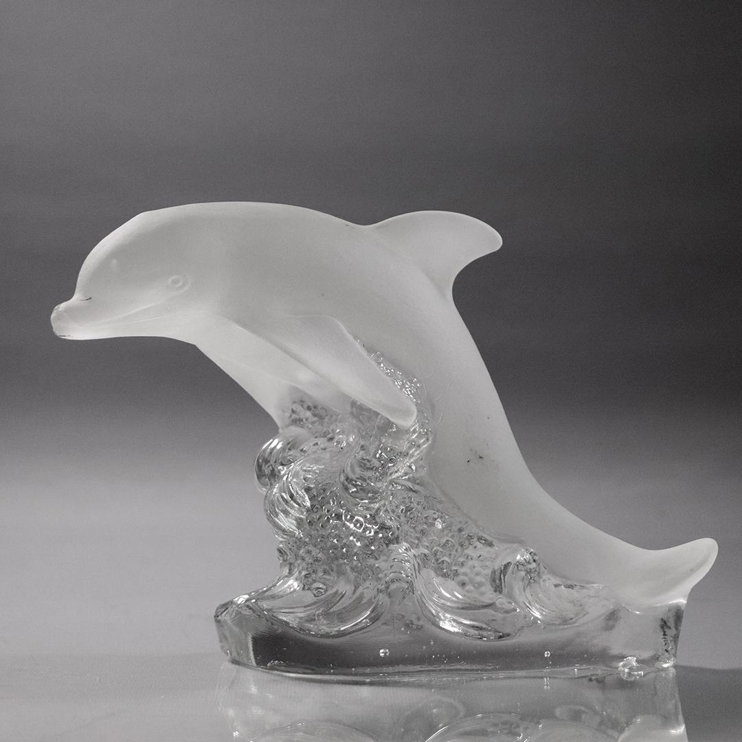 Goebel Satin Glass Dolphin on Crystal Wave Figurine: Goebel Satin Glass Dolphin on Crystal Wave Figurine. Signed: Goebel. Size: 7 in. height; 9.5 in. wide