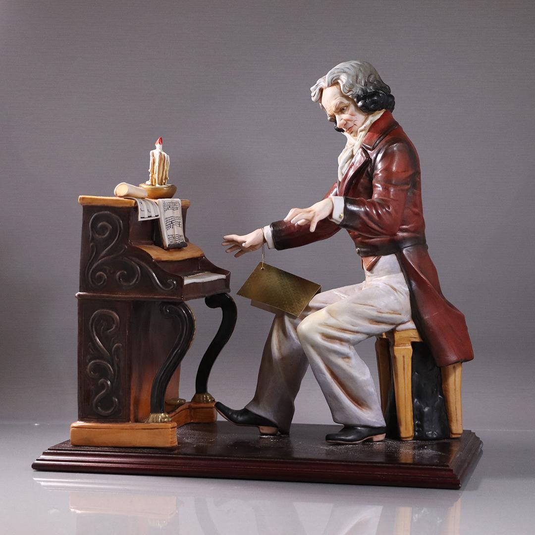Beethoven Playing a Piano Large Porcelain Grouping: Beethoven Playing a Piano Large Porcelain Grouping. Size: 15 in. height x 15 in. wide x 8 in. depth