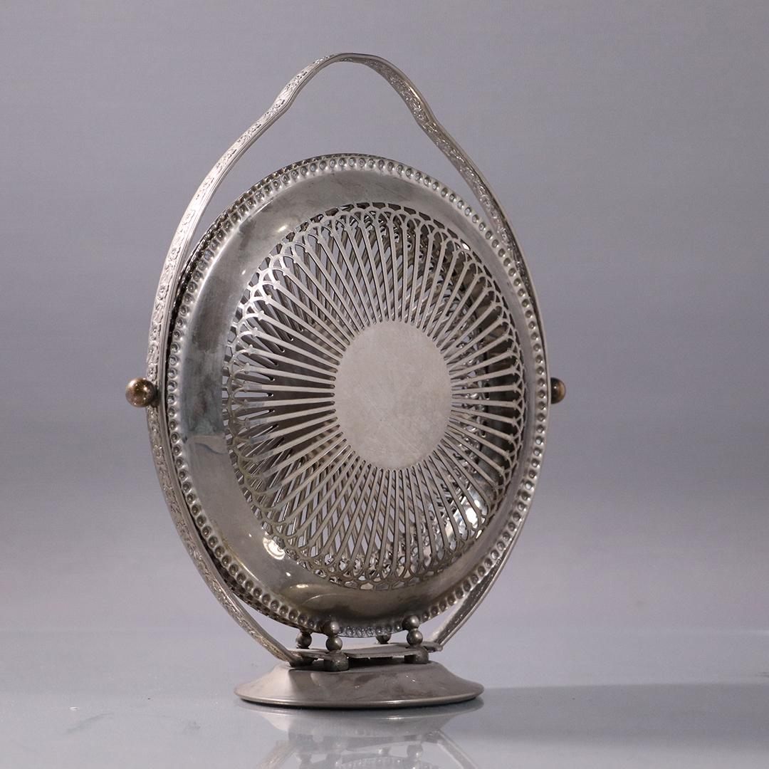 English Continental Silver Plate Fold-Out Muffineer: English Continental Silver Plate Fold-Out Muffineer. Made in England. Size: 10 in. height x 8 in. wide