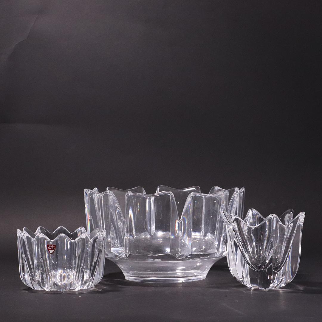 [3] Signed ORREFORS Mid-Century Cubism Crystal Bowls: [3] Signed ORREFORS Mid-Century Cubism Crystal Bowls with original labels. 3 different sizes. Size: 5 in. height x 9 in. diameter, 3 in. height x 4.75 in. diameter , and 4 in. height x 4.5 in. diamete