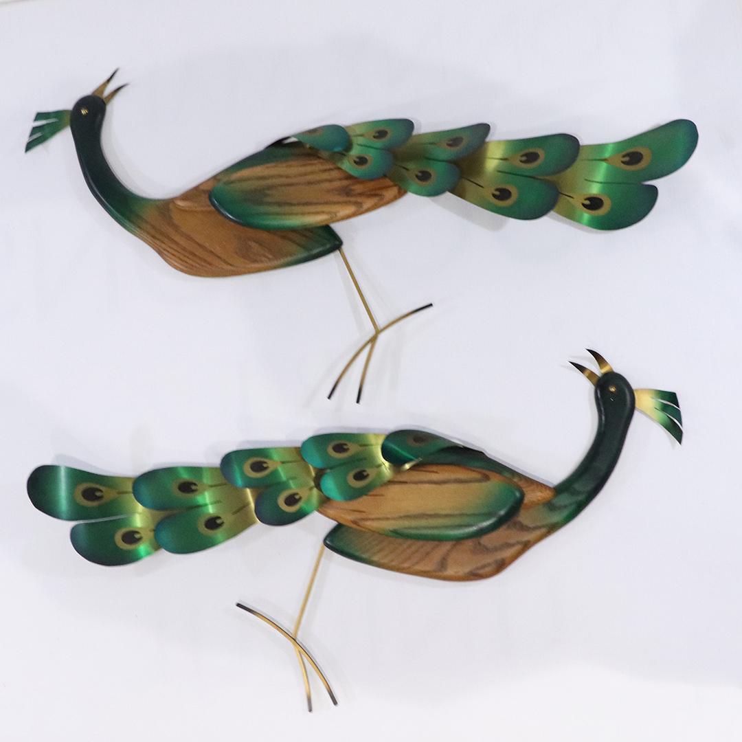 [2] Two Mid-Century Modern Peacock Wall Hangings: [2] Two Mid-Century Modern Peacock Wall Hangings, metal and wood. Clean, all original finish. Stamped on backside with date 1965. Size: 33 in. length x 22 in. wide