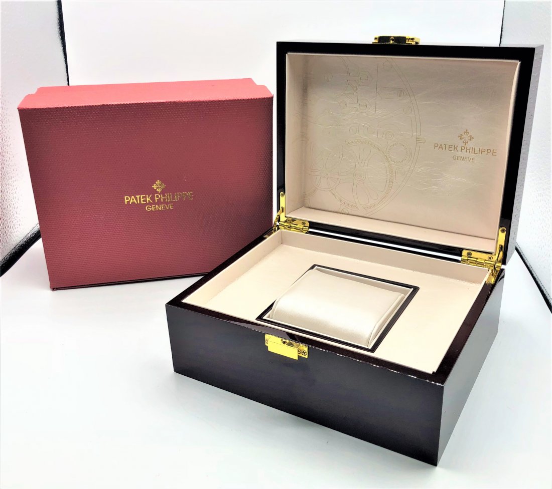 Patek Philippe Geneve, Cherry Mahogany Watch Case Box: Patek Philippe Geneve, Polished Cherry Mahogany Watch Case Box with original box. No Watch - Cherry Mahogany Case Box only. Cherry Mahogany is polish lacquer finish, fitted interior. Superb Quality. S