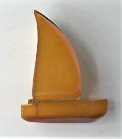 Vintage Amber Bakelite Sailboat Brooch .925 Sterling: Vintage Amber Bakelite Sailboat Brooch .925 Sterling Vermeil backing pin. Size: 1.25 in. height, 1 in. wide