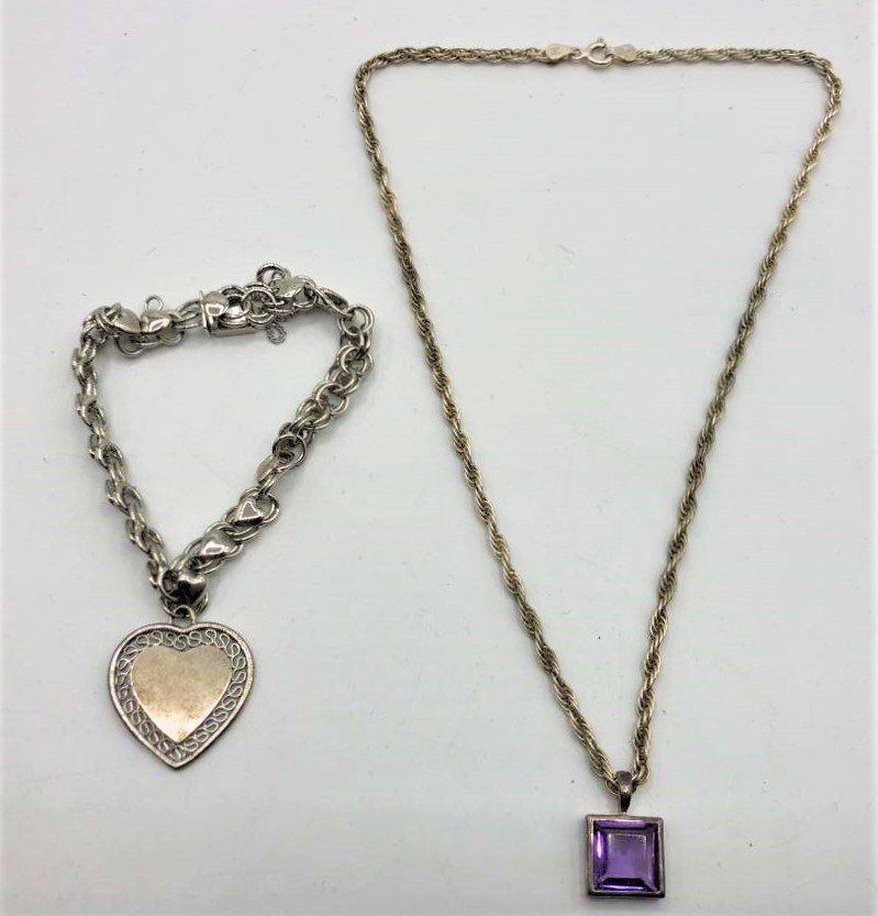 2 Pcs Sterling Necklace Amethyst Pendant Heart Bracelet: 2 Pcs Sterling Necklace with Amethyst Pendant and Heart [Merry Christmas] Sterling Bracelet. Marked: necklace .925; bracelet Sterling. Size: pendant 1/2 in. diameter, 16 in. chain; bracelet 7.5 in. le