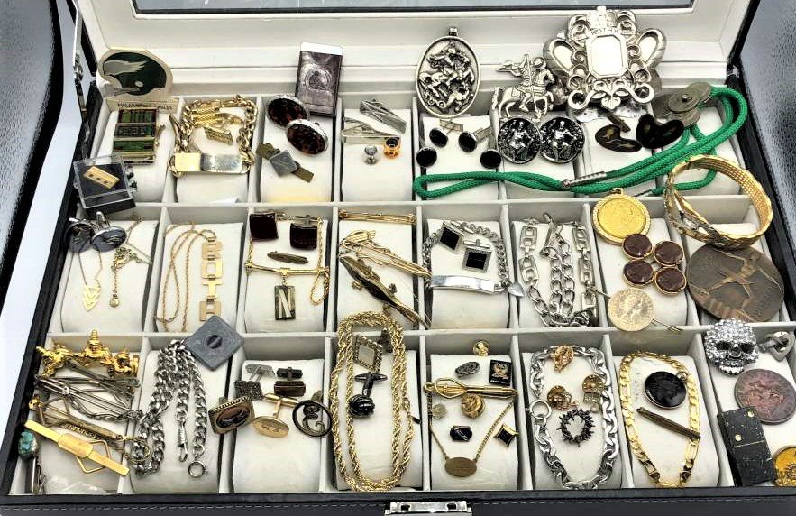 [70] Seventy Assorted Costume Jewelry MAN LOT - Variety: [70] Seventy Assorted Costume Jewelry MAN LOT - Variety. Cuff links, bracelets , pendants, Century of Progress bronze medallion, chains, intaglio brooch, more. Note: display case not included.