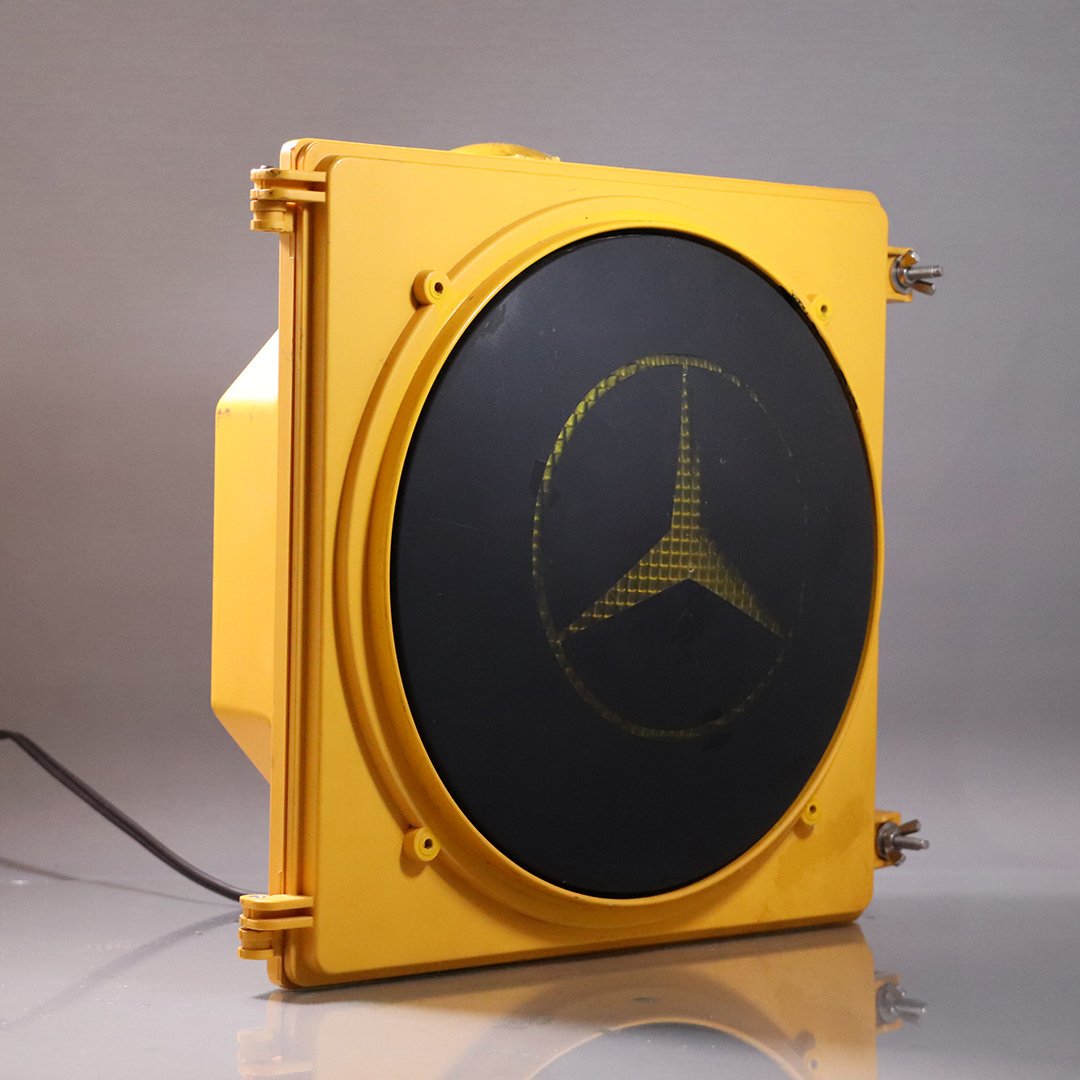 Mercedes Benz Light Up Display Insignia / Store Prop: Mercedes Benz Light Up Display Insignia / Store Prop. Yellow plastic case Street Light with Round Mercedes Benz Emblem Insignia. Electric, Wiring good, lights fine. Size: 15 in. height, 13.7 in. wide,