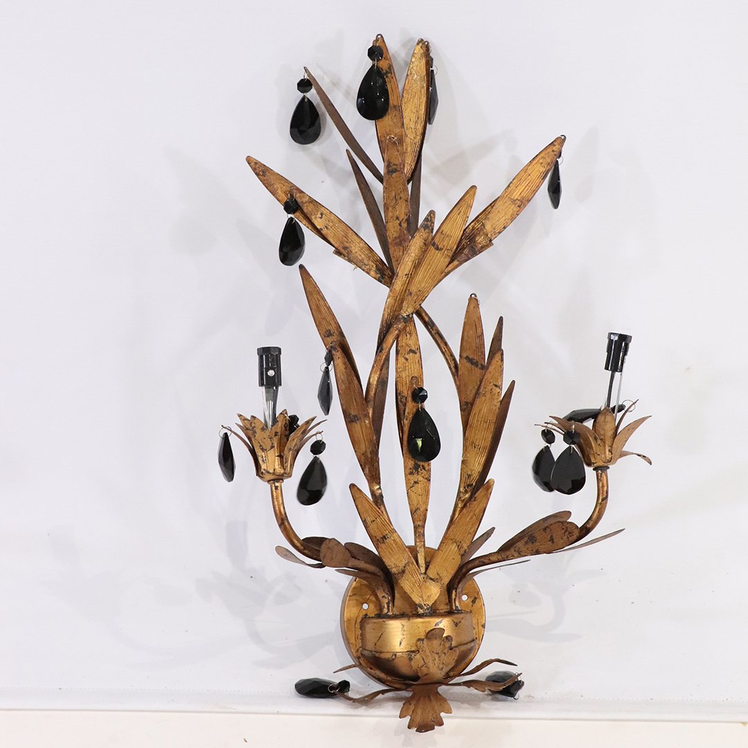 Hollywood Regency Gold Gilt Toleware Wall Sconce: Hollywood Regency Gold Gilt Toleware Wall Sconce. Spray of Leaves with Black Glass Prisms, 2 electric lights. Size: 24 in. length, 14 in. wide