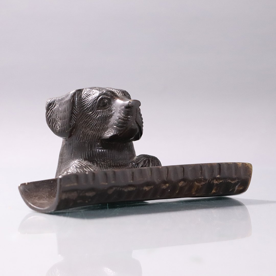 Cast Bronze Dog Head Desk Top Pen Holder: Cast Bronze Dog Head Desk Top Pen Holder. Good patina finish. Size: 3.25 in. height, 6.5 in. length, 4 in. wide