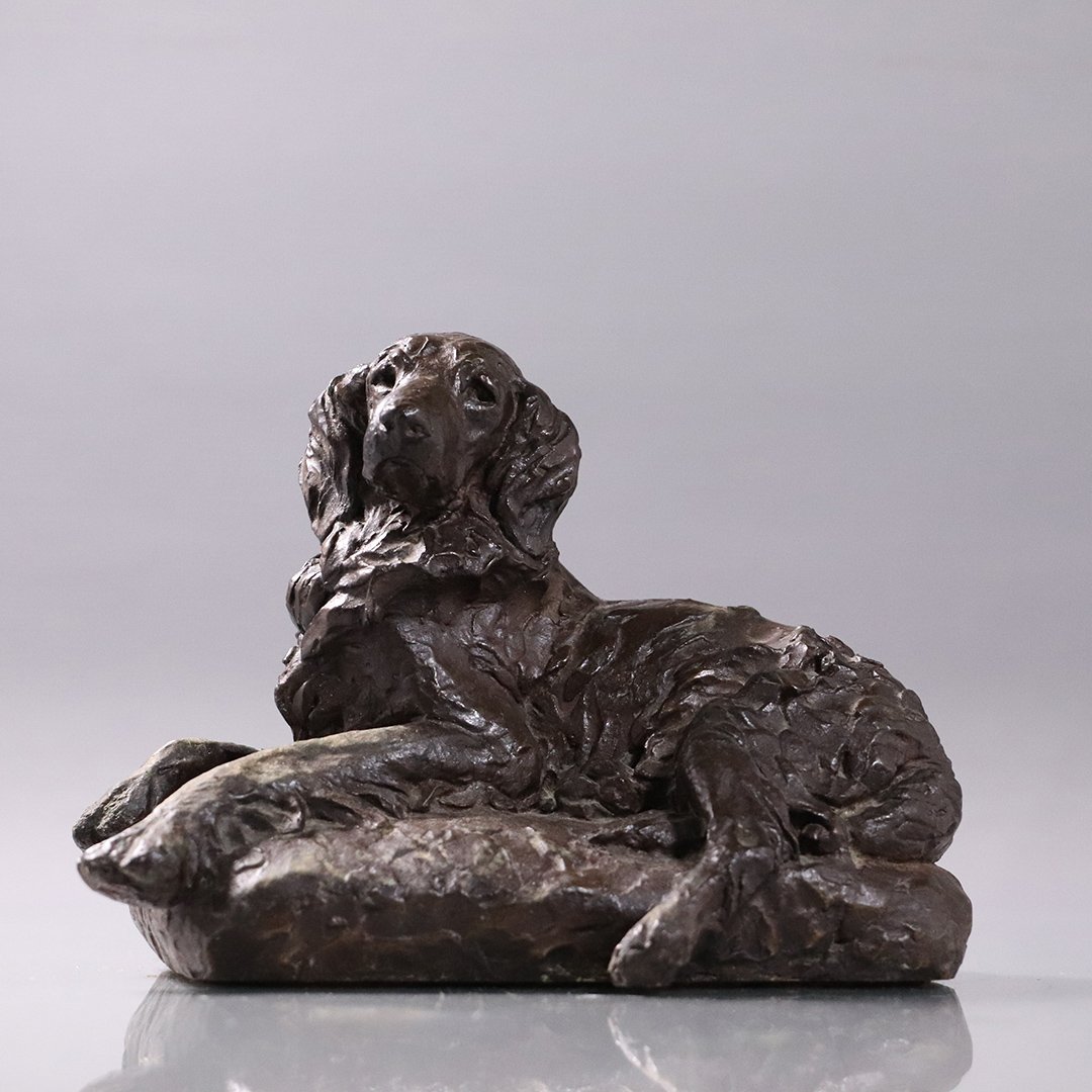 Vintage Bronze Clad Reclining Dog Statue: Vintage Bronze Clad Reclining Dog Statue, Good patina finish. Size: 5 in. height, 7 in. length, 5 in. wide