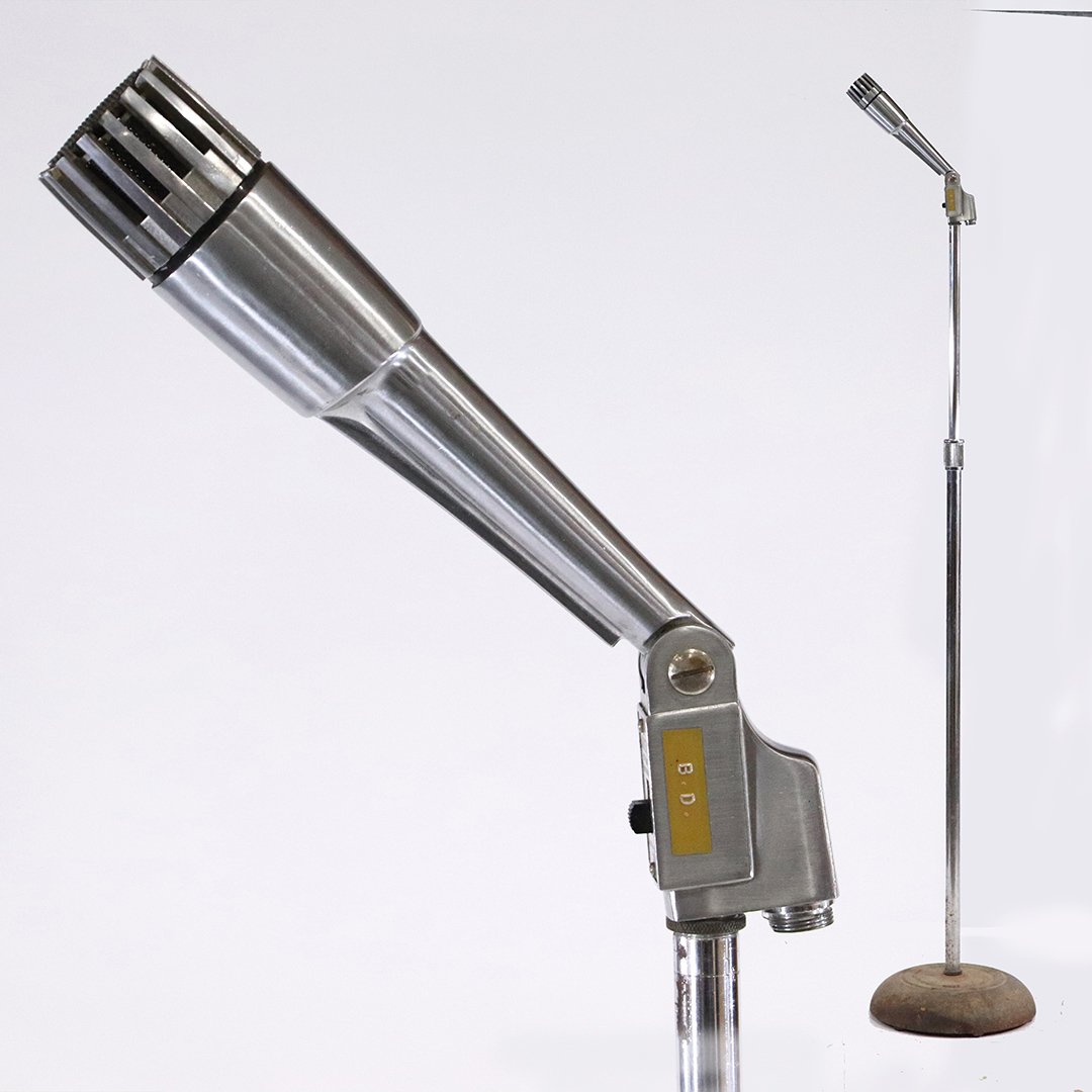 Vintage Lafayette Dynamic Microphone on Stand-up Base: Vintage Lafayette Dynamic Microphone on Stand-up Base. Chrome microphone, iron base. Size: 55 in. height, 10 in,. diameter basew.
