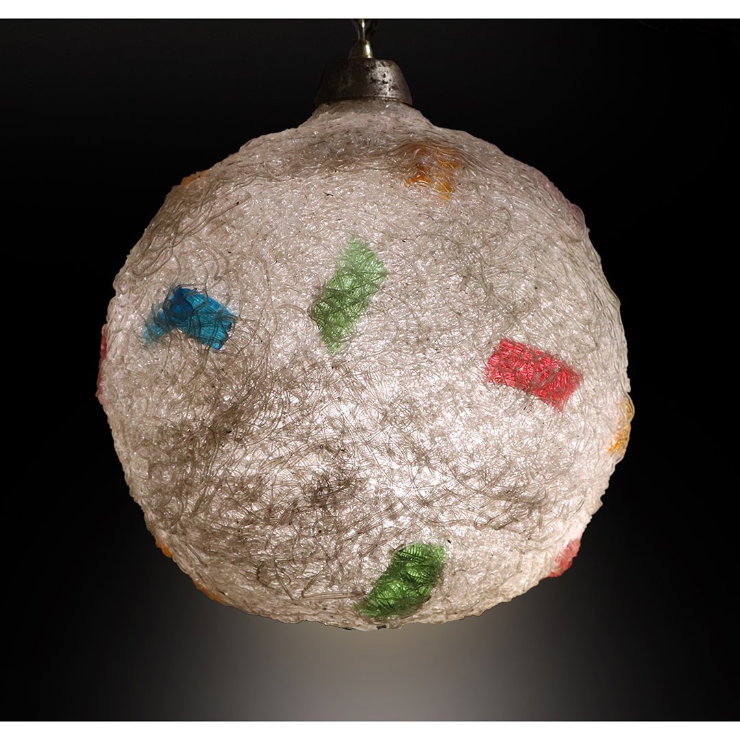 Mid-Century Modern Spaghetti Round Ball Hanging Fixture: Mid-Century Modern Spaghetti Round Ball Hanging Fixture. Made of White Spaghetti Lucite with Multi Color Accents. Hangs with a swag chain. Size: 14 in. height, 12 in. diameter ball.