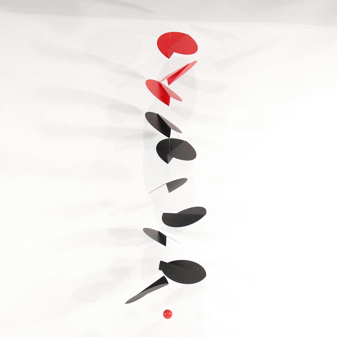 Ole Flensted Design Red & Black Mobile "Turning Leaves": Ole Flensted Design Red & Black Mobile "Turning Leaves" with original box. Size: mobile 36 in. length, 10 in. wide.