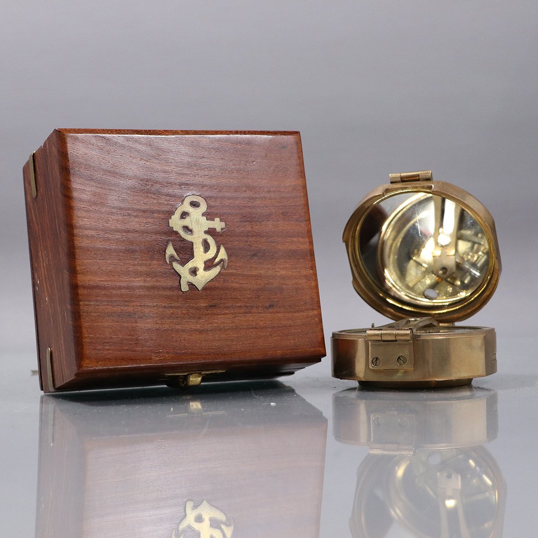 Nautical Brass Compass in Wood Case "Natural Sine": Nautical Brass Compass in Wood Case "Natural Sine". Size: compass 1.25 in. x 3 in.; box 2.5 in. x 4.5 in. x 4.25 in.