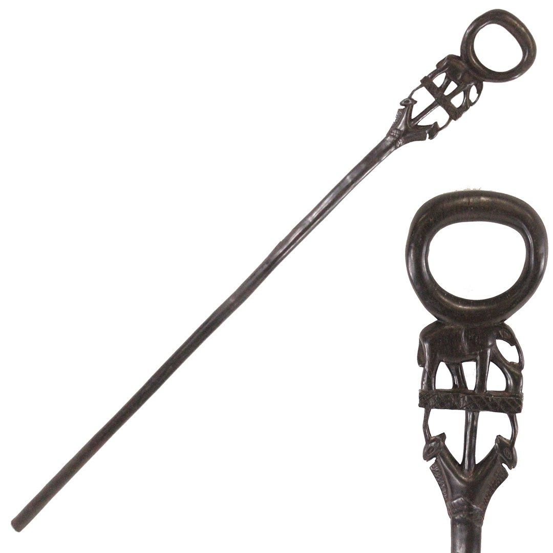 Asian Ebony Wood Walking Cane with Carved Elephant: Asian Ebony Wood Walking Cane with Carved Elephant. Size: 40.5 in. length, 5 in. x 4 in. carved elephant handle.