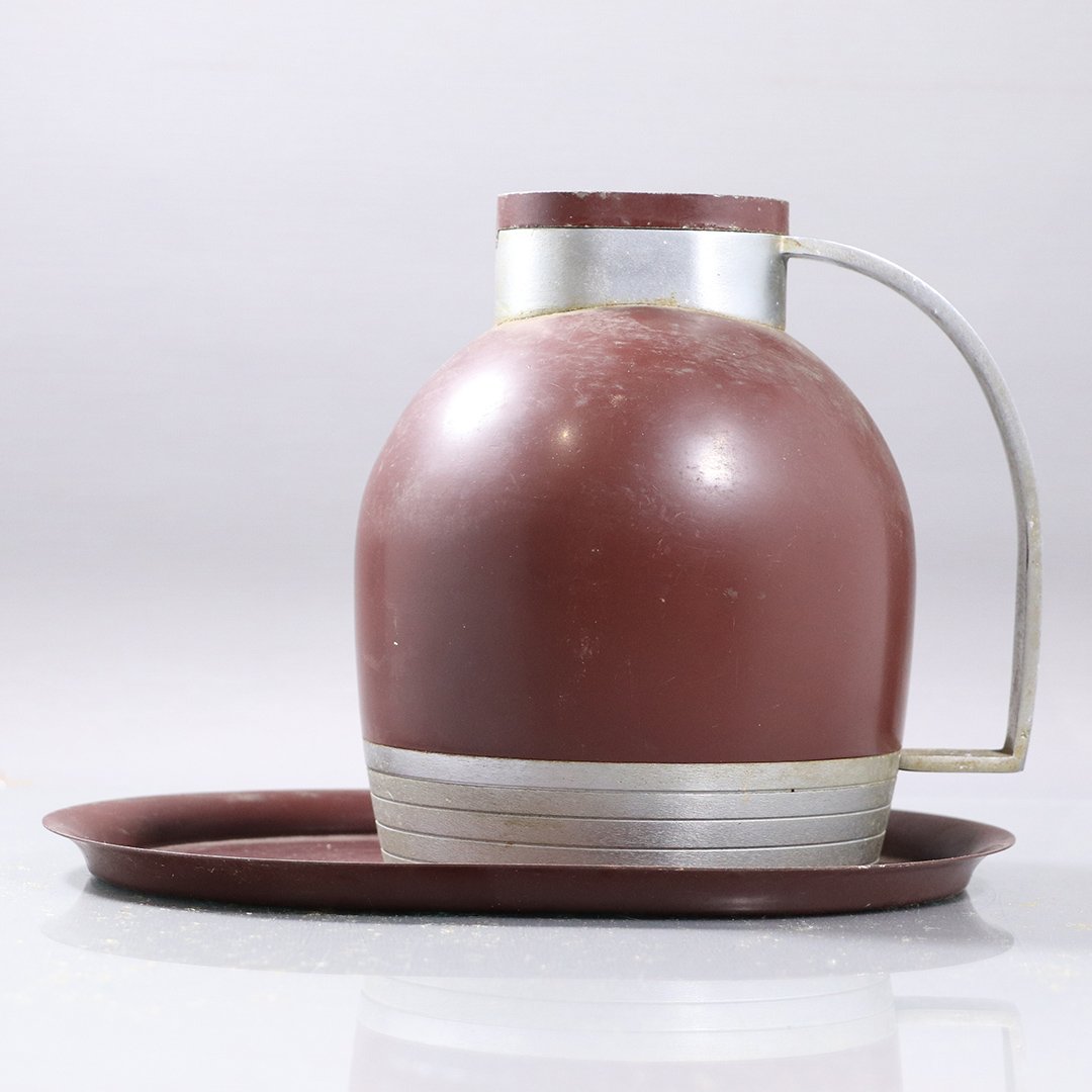 Henry Dreyfuss Industrial Designer Pitcher and Tray: Henry Dreyfuss Industrial Designer Pitcher and Tray. Size: pitcher 7.5 in. height, 7 in. wide ; tray 10.5 in. length, 7.75 in. wide