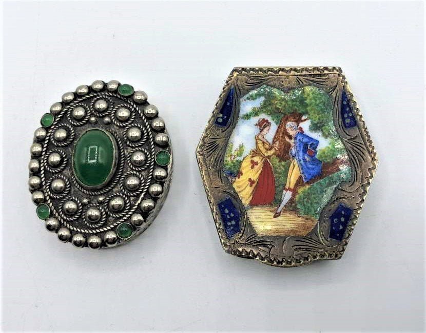 [2] Pill Boxes, Silver and Enameled Top; Green Stones: [2] Pill Boxes, Silver and Enameled Top Man and Woman courting Scene; Green Stones on silver oval box. Size: 1 7/8 in. x 1 3/4 in. and 1 1/2 in. x 1 1/4 in. oval