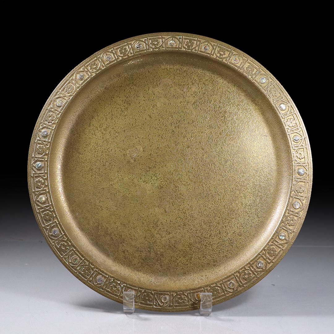 TIFFANY STUDIOS NEW YORK 1728 Gold Dore Charger: TIFFANY STUDIOS NEW YORK 1728 Gold Dore Charger with jeweled border rim. Godd original patina finish. Marked: Tiffany Studios New York #1728 ; size: 14.25 in. diameter