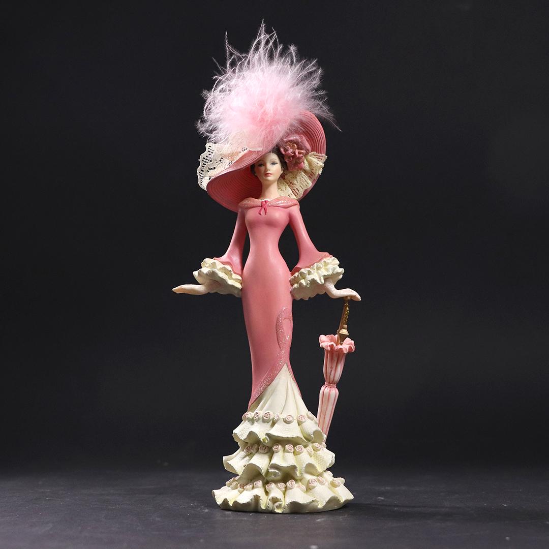 Thomas Kinkade "A Vision of Hope" Fashion Girl Figurine: Thomas Kinkade "A Vision of Hope" Fashion Girl Figurine. Marked on base and limited numbered. size: 7.5h x 3.5w