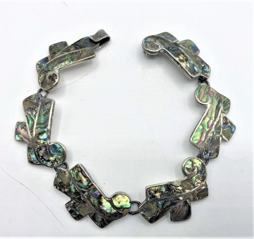.925 Sterling and Abalone Linked Bracelet Taxco Mexico: .925 Sterling and Abalone Linked Bracelet Taxco Mexico. Marked: Sterling, Taxco .925, Mexico .925 ; Size: 7.5 in. length, 3/4 in wide.