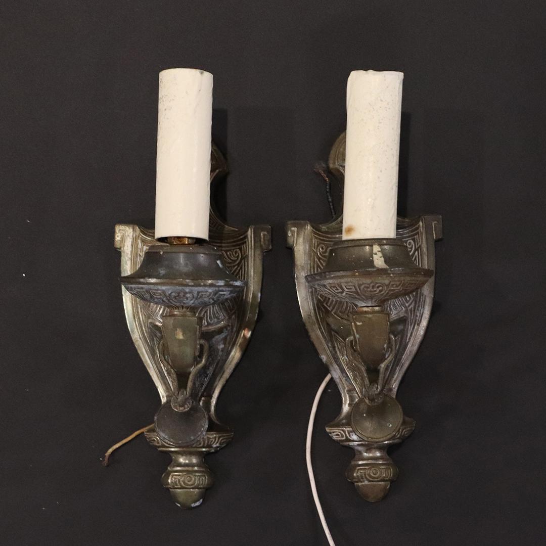 Pair Vintage Empire Cast Metal Shield Back Wall Sconces: Pair Vintage Empire Cast Metal Shield Back Wall Sconces. Signed: Empire, Patent Pending. size: 10h x 4w x 5.25d