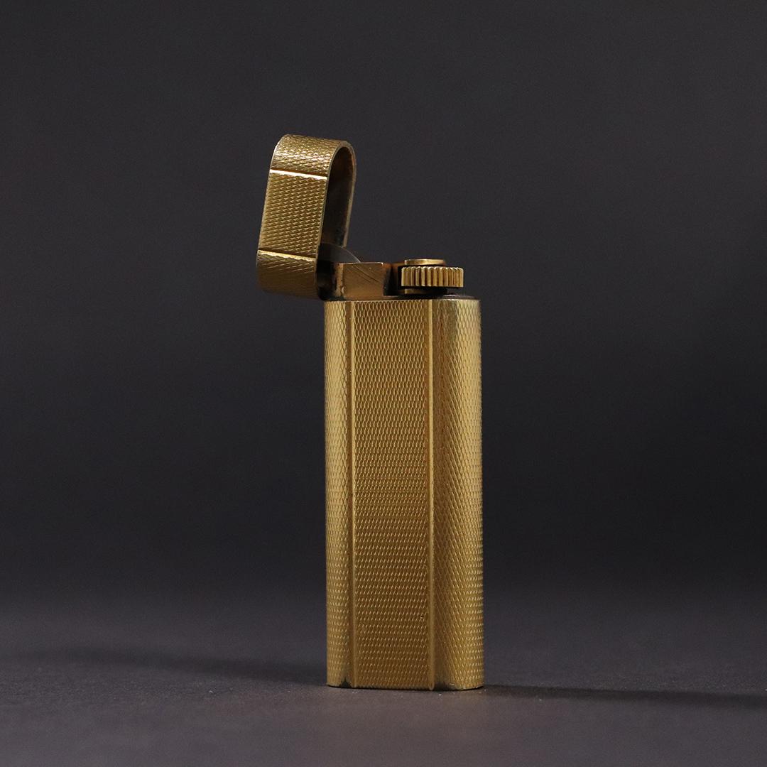 Cartier, Vintage Gold Plated Cigarette Lighter, Papers: Cartier, Vintage Gold Plated Cigarette Lighter, with Papers. size: 2.75L x 1w