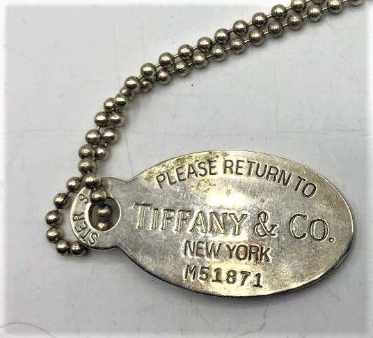 TIFFANY & CO Sterling Silver .925 Dog Tag and Chain: TIFFANY & CO Sterling Silver .925 Dog Tag and Chain. size dog tag 1.75 in. x 7/8 in. ; chain 33 in. length