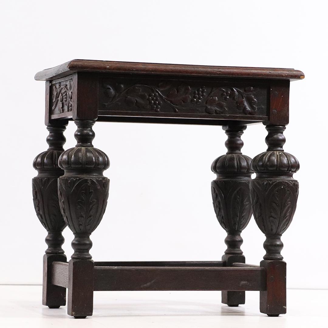 Circa 1920 Oak Jacobean Small Rectangular Stand: Circa 1920 Oak Jacobean Small Rectangular Stand. Plaque on underside Made in Belgium. Original dark finish. size: 18.5h x 18L x 12w
