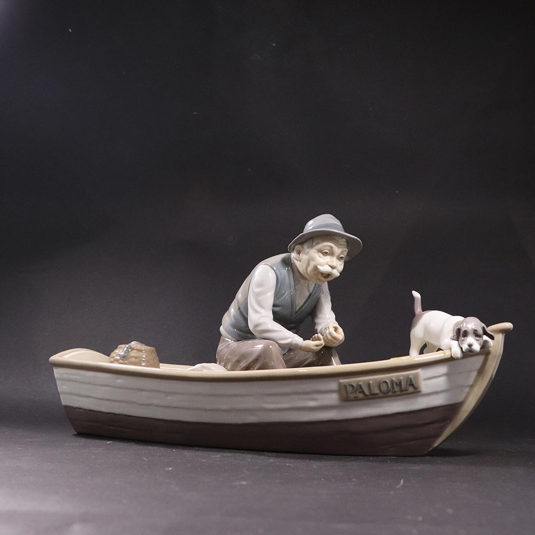 Lladro, Large size Man with Dog in Row Boat: Lladro, Large size Man with Dog in Row Boat. size: 7.5h x 15.5L x 6w
