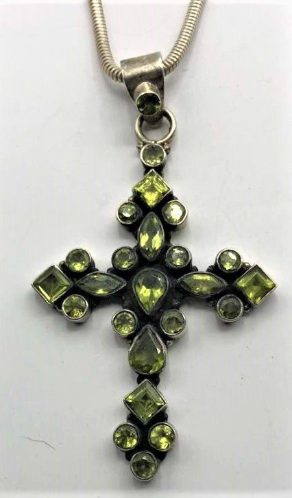 Sterling Silver Large Peridot Cross Necklace: Sterling Silver Large Peridot Cross Necklace with a peridot on bail. Size: cross 3 in. x 1.75 in.; long heavy chain 33 in. length
